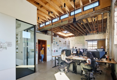 Office interior of DBA_BHM with staff working at the Bandsaw Building in Birmingham, Alabama.
