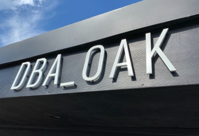 Detail of the DBA_OAK sign on the exterior of David Baker Architects Office in Oakland, California.