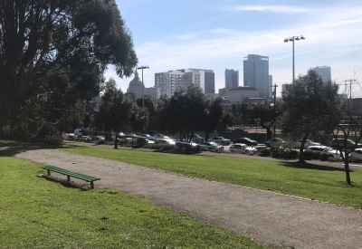 Jefferson Square Park in San Francisco with a rendered 600 McAllister in the background.