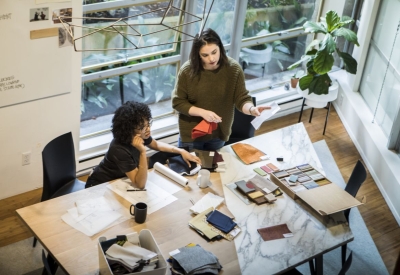 Two women working at the Annex table.