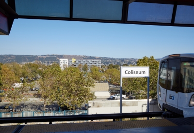 Wide shot of Coliseum Place taken from BART in Oakland, California.