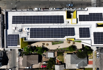 Aerial view showing the solar panels on the roof of Coliseum Place in Oakland, California.