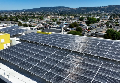 Close up of the solar panels on top of Coliseum Place in Oakland, California.