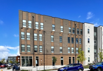 Exterior street view of Maple Crest Apartments at Lee Walker Heights in Asheville, North Carolina.