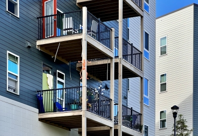Exterior view of the balconies at Maple Crest Apartments at Lee Walker Heights in Asheville, North Carolina.
