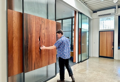 DBA_OAK sliding doors separating the conference room.