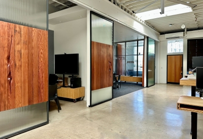 DBA_OAK sliding doors separating the conference room.