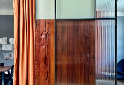 DBA_OAK sliding doors separating the conference room and storefront.
