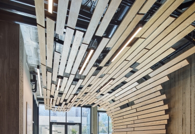 Custom wood ceiling and bench at 555 Larkin in San Francisco.