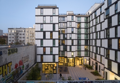 Birds eye view of the courtyard at 555 Larkin at dusk.