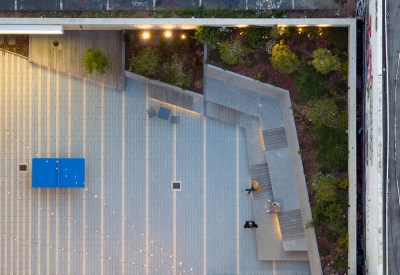 Aerial view of the courtyard at 555 Larkin at dusk.