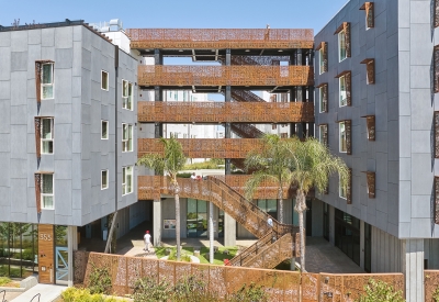 Aerial view looking at the entry courtyard and open-air stair at Sango Court.