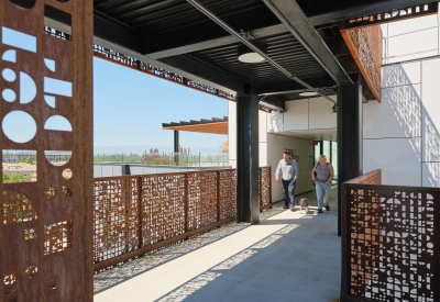 Walking through the open air bridges at Sango Court.