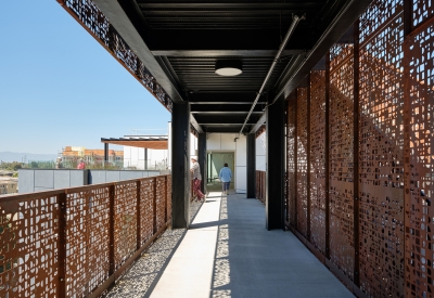 Walking through the open air bridges at Sango Court.