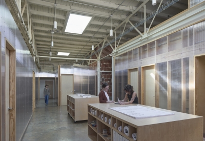 Mobile carts outside of private offices at Wyatt Builds office.