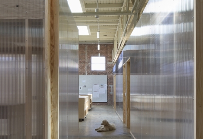 Hallway of the translucent double-walled polycarbonate panels private offices at Wyatt Builds office.