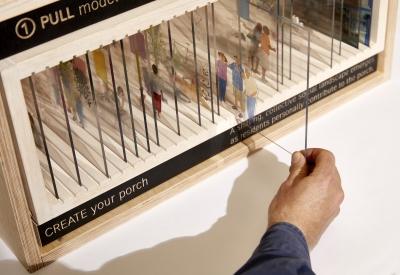 Product photography of architectural model, detail showing interaction