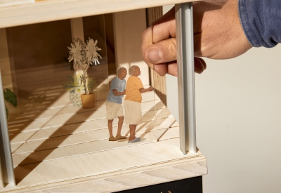 Product photography of architectural model, detail showing interaction