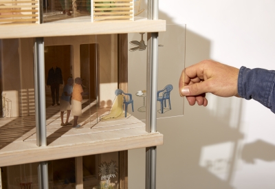 Product photography of architectural model, detail showing interaction