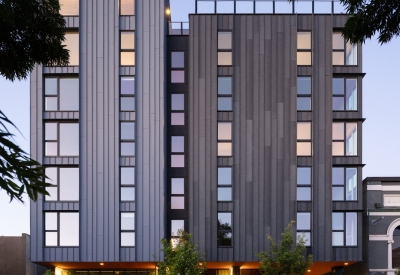 Exterior street view of Felix at dusk.