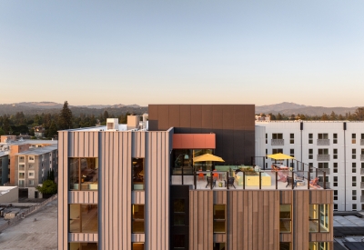 Birds eye view of the roof deck at dusk.