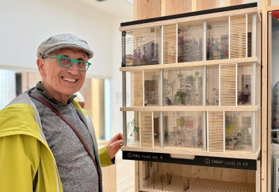 David Baker posing next to the installation.