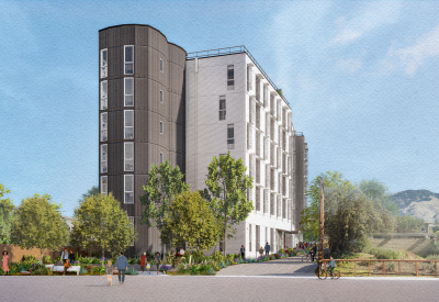 Gray and white building against blue sky