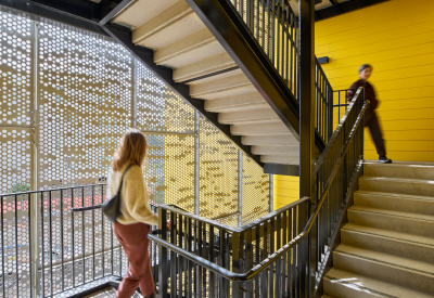 Stairwell with perforated metal and filtered light
