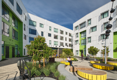 Courtyard with curvilinear benches and vegetation
