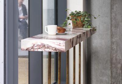 Detail shot shows a narrow bar at the window