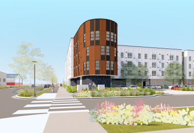 Rendering of a distant view of a rounded corner bay on a four-story building