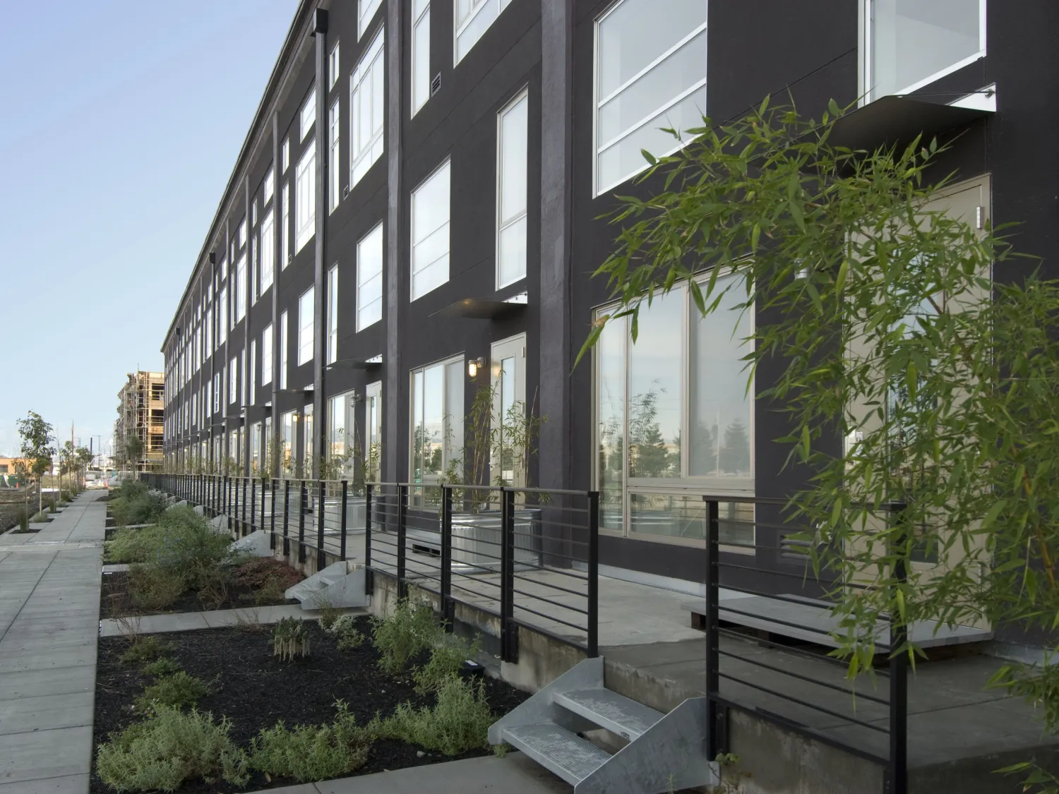 Ground floor patios at Pacific Cannery Lofts in Oakland, California.