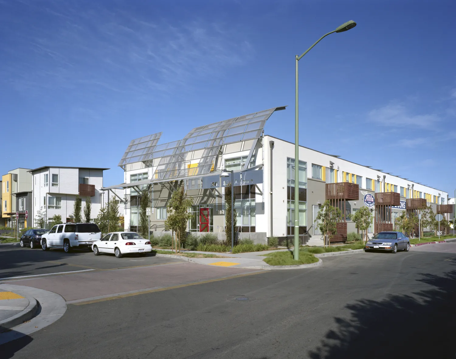 Exterior view of supportive housing units at Tassafaronga Village in East Oakland, CA. 