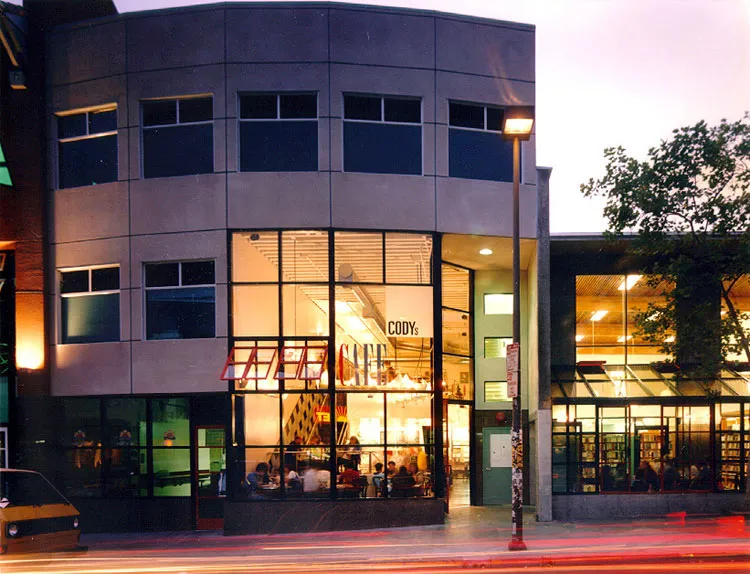 Exterior street view of  Fred Cody Building & Cody's Cafe at dusk in Berkeley, California.