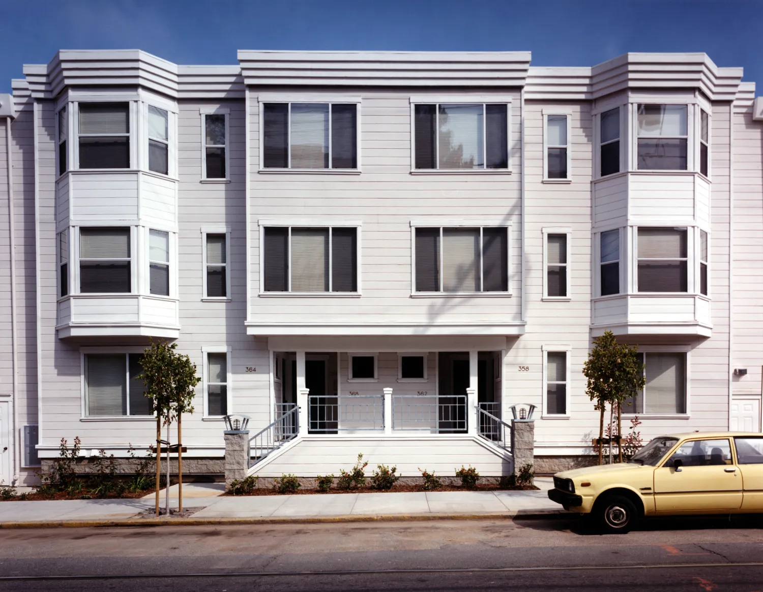 Exterior view of the three-story units along Frederick Street at Parkview Commons in San Francisco.