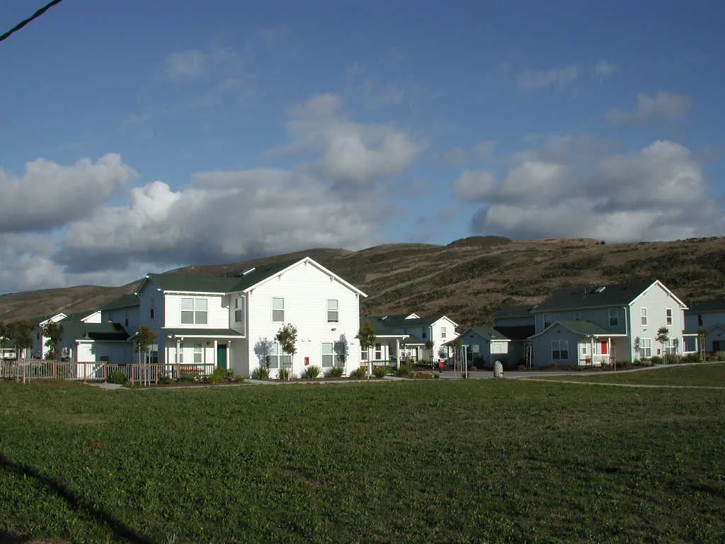 View of the grass area with Moonridge Village in Santa Cruz, California in the background.