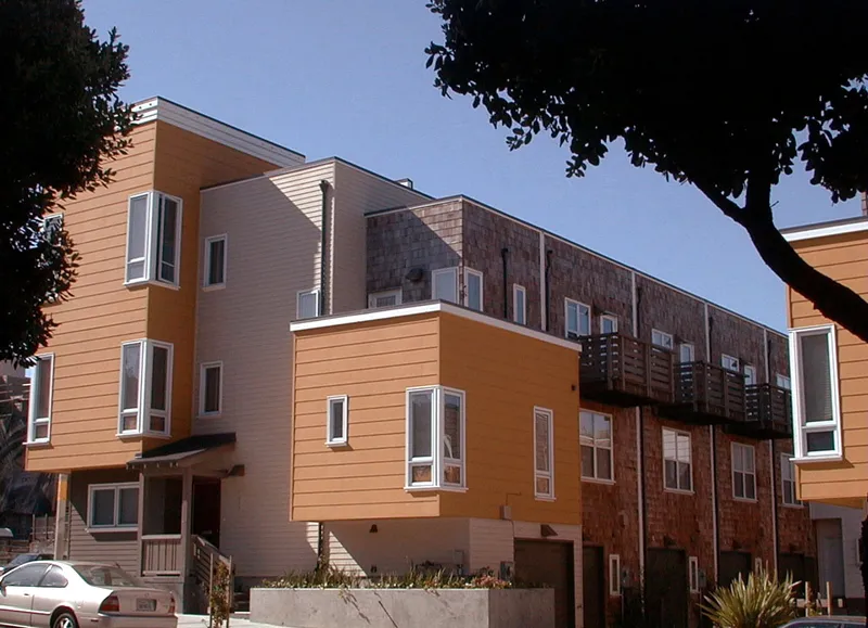 Exterior street view of courtyard, mews, and balconies at Bell Mews in San Francisco. 