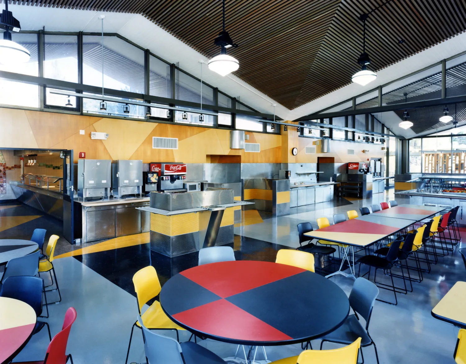 Interior view of U.C. Berkeley Dining Halls with an abundance of seating.