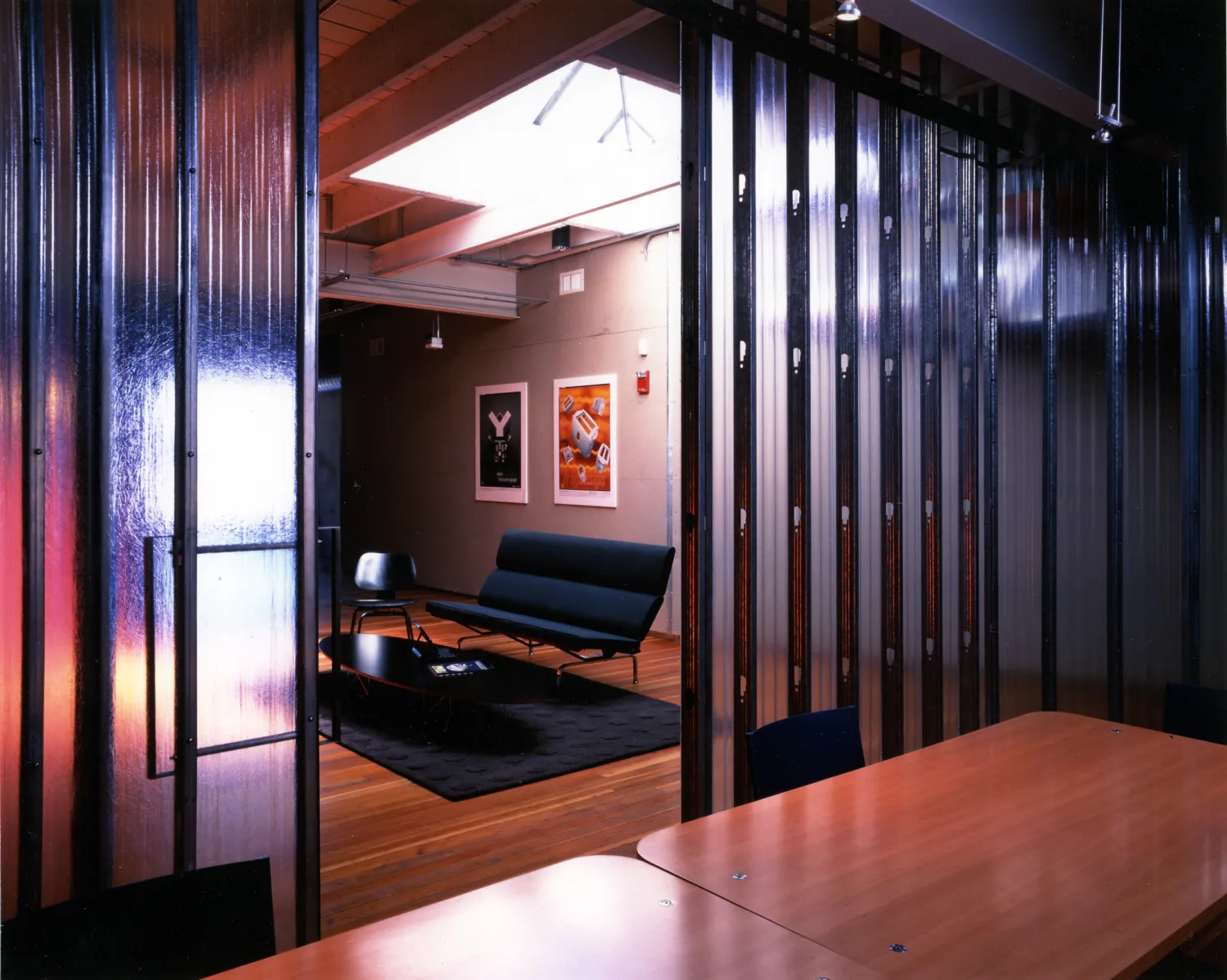 Second floor conference room with conference table and conversation chairs at Frogdesign Studio in San Francisco. 