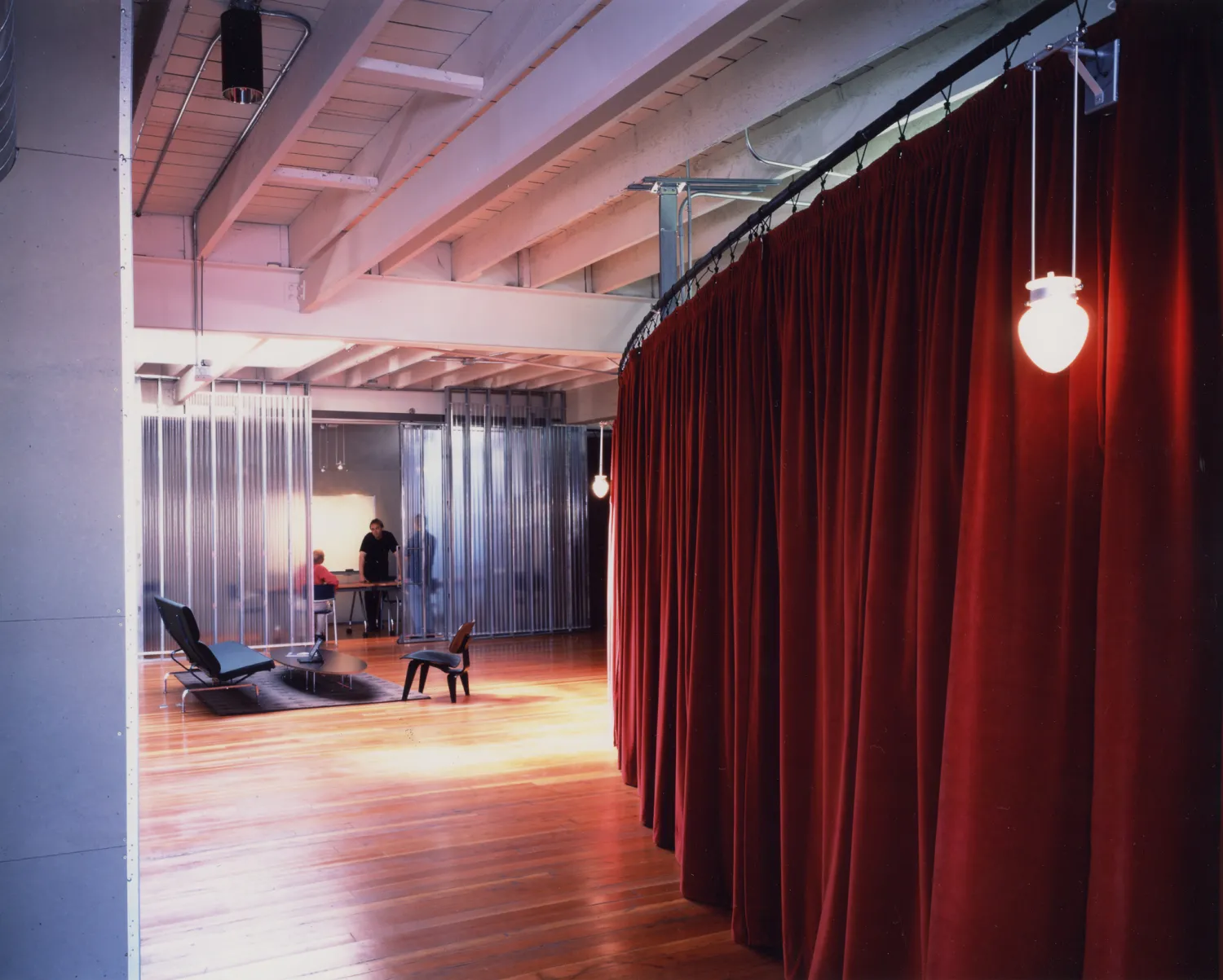 View of the second floor conference room with conversation chairs at Frogdesign Studio in San Francisco. 