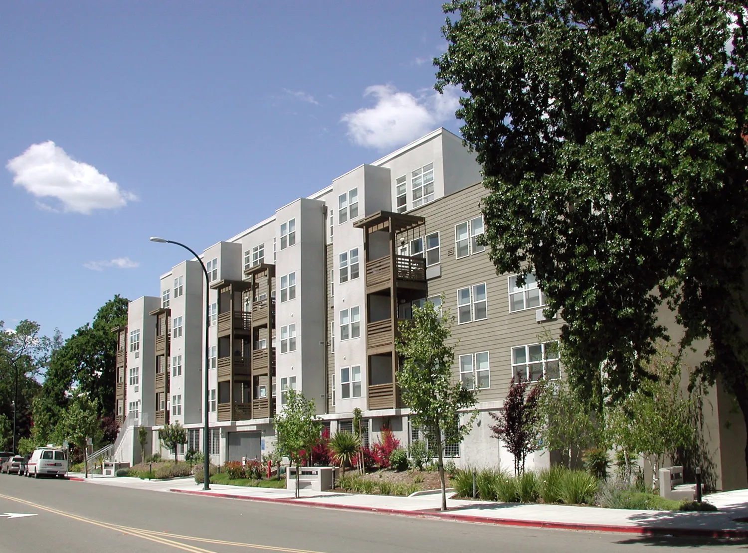 Exterior view of the elevation at Las Juntas Way at Coggins Square in Walnut Creek, California.