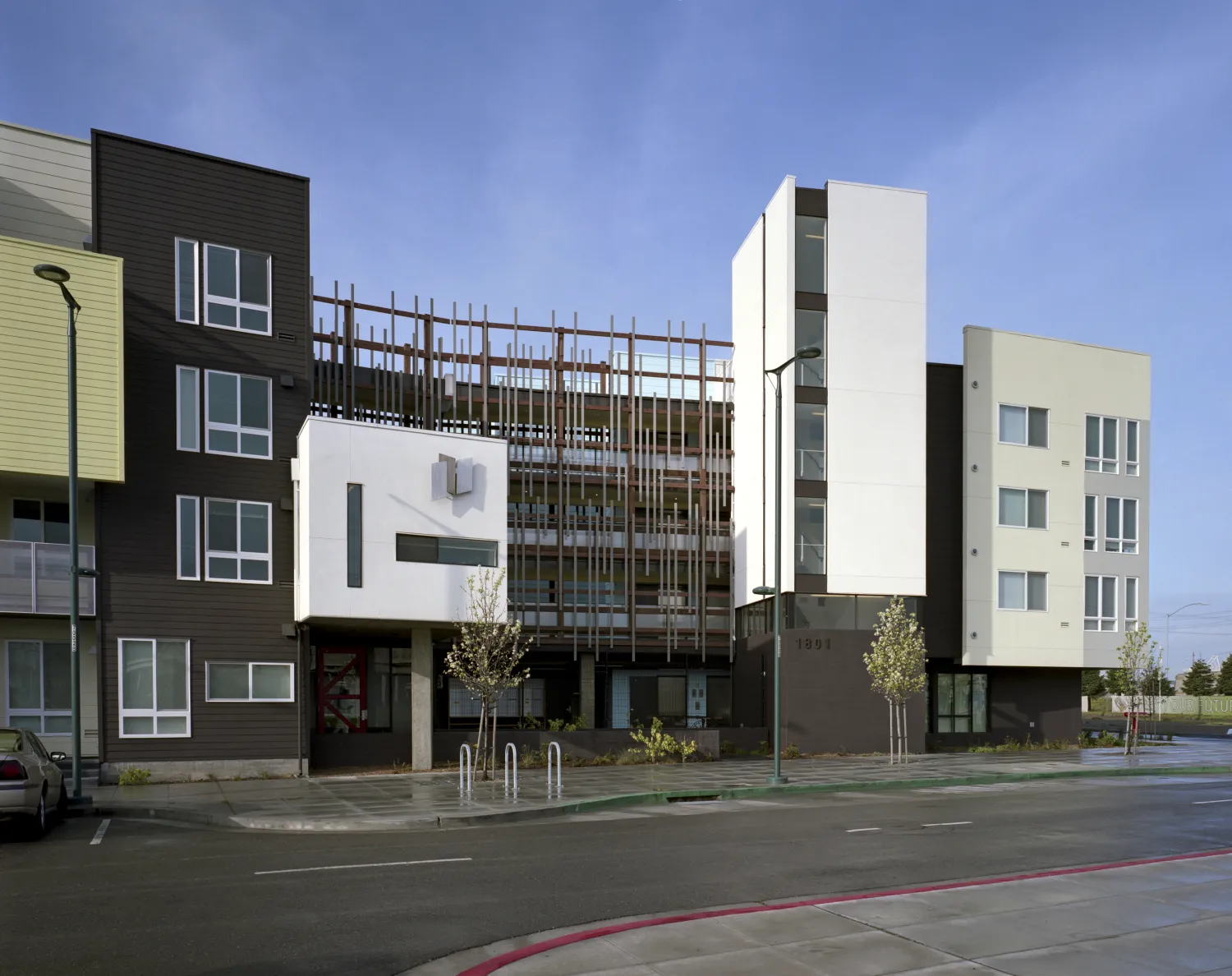 Exterior view of the residential entry at Ironhorse at Central Station in Oakland, California.