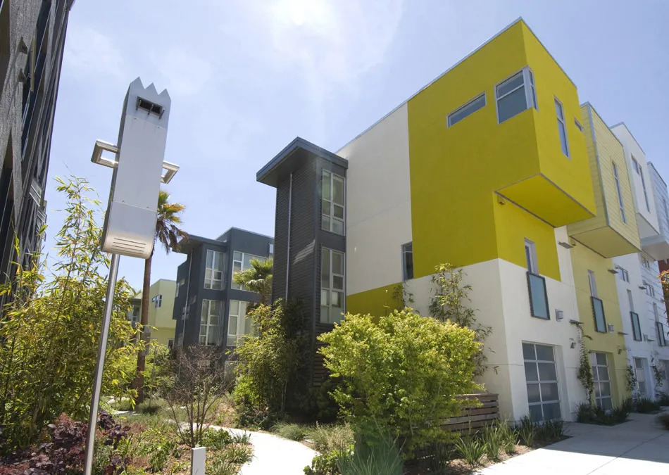 Bird house sculpture and townhouses at Blue Star Corner in Emeryville, Ca.