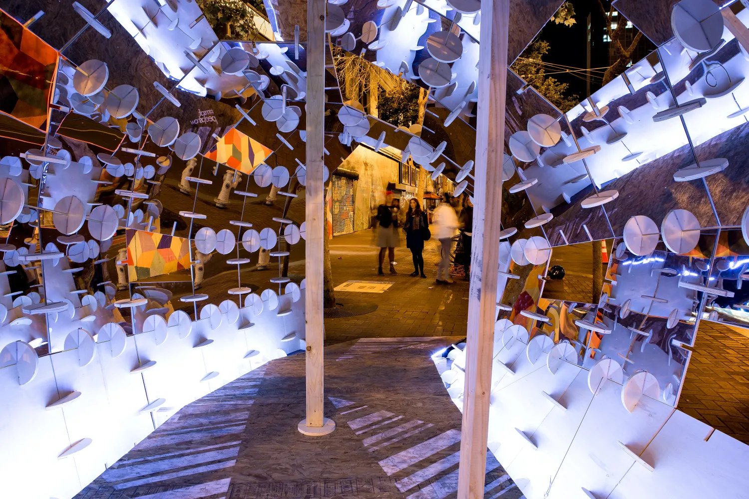 DBA's installation, PeepSHOW, for the Market Street Prototyping Festival in San Francisco at dusk.