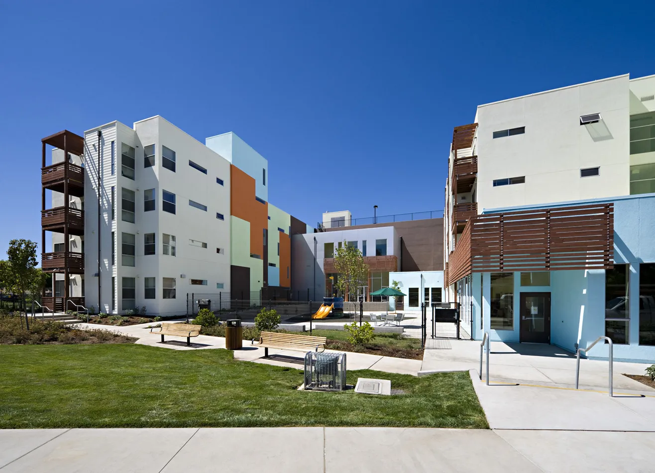 Open community space and small play area at Paseo Senter in San Jose, California.