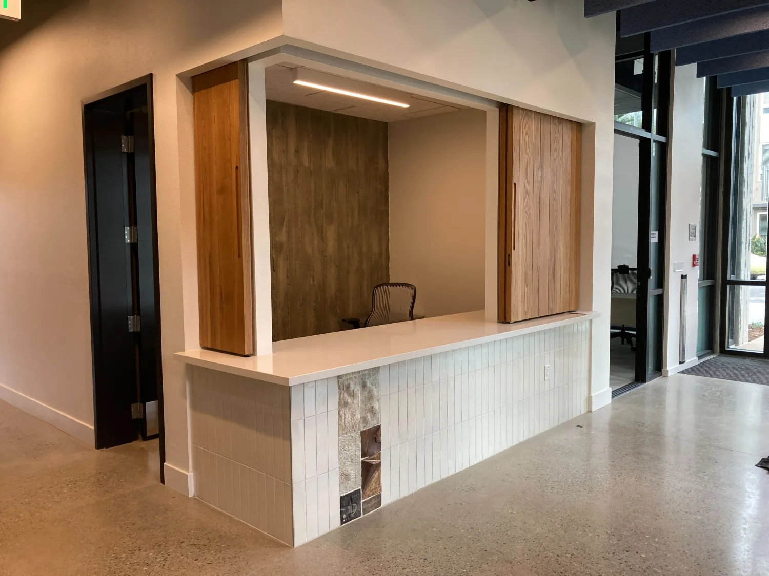 Lobby reception desk custom made by DBA Workshop inside Page Street Studios in San Jose, Ca