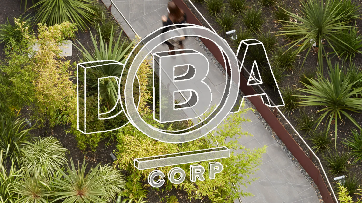 Text: "DBA B Corp" with a background of a bike path and plants.