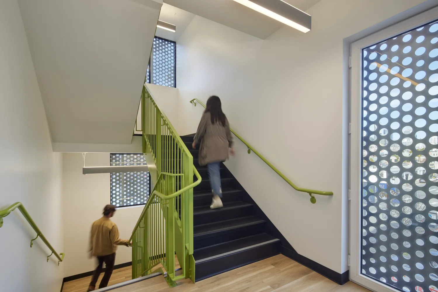 Indoor stair at Tahanan Supportive Housing in San Francisco.