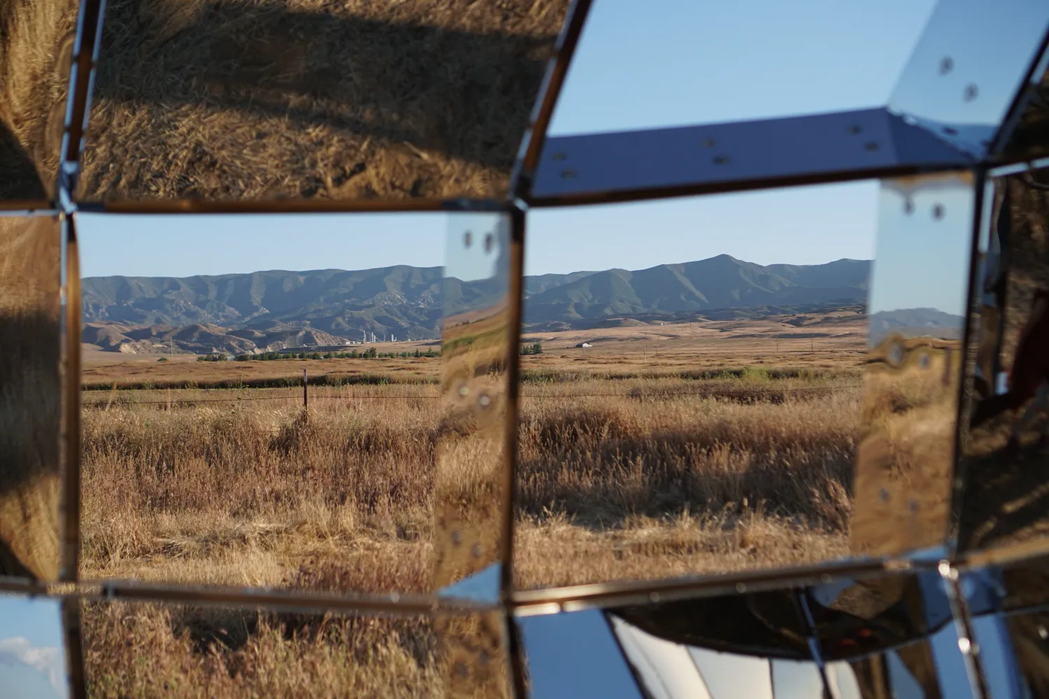 peepSHOW detail reflecting in the sun in the desert in New Cuyama, California.