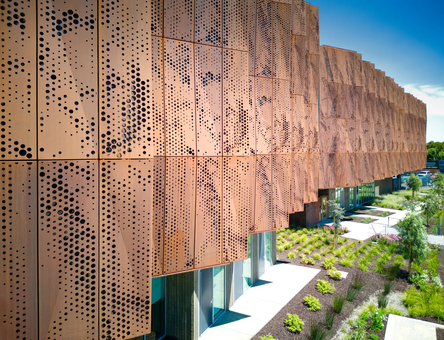 Detail view of the weathering cor-ten facade sunshades on the exterior of Blue Oak Landing in Vallejo, California.